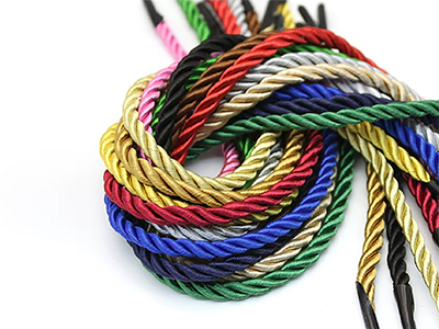 Cabeteadora de asas de bolsas de cuerda